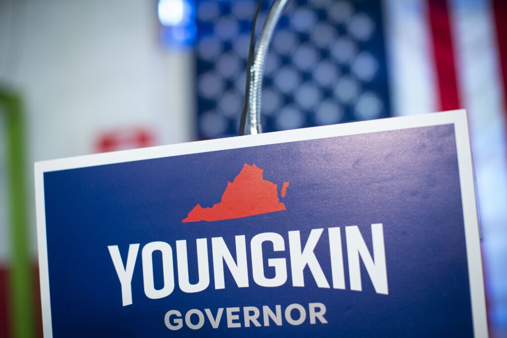 A campaign sign for Glenn Youngkin, Republican gubernatorial candidate for Virginia, during an event in Fairfax, Virginia, U.S., on Monday, Aug. 30, 2021. Youngkin, the former Carlyle Group co-chief executive officer, is seeking to carefully tap into the energy that former President Trump brought to the Republican grassroots while keeping the party's most conservative element at arms' length so as not to turn off the states key suburban voters. Photographer: Al Drago/Bloomberg via Getty Images