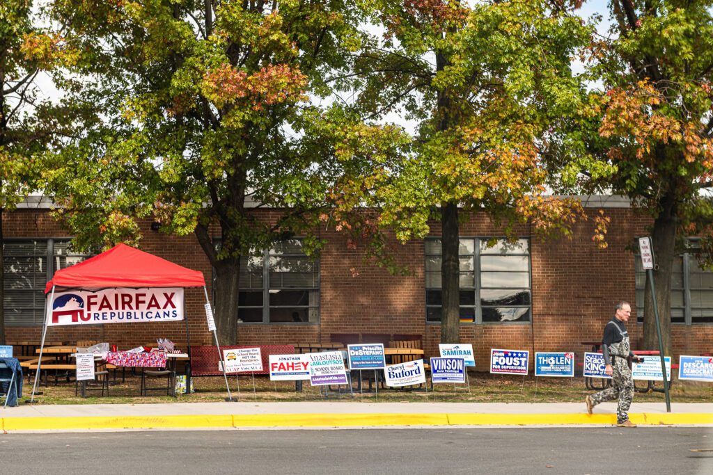 Volunteers outside a polling place in Virginia