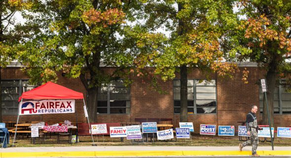 Volunteers outside a polling place in Virginia