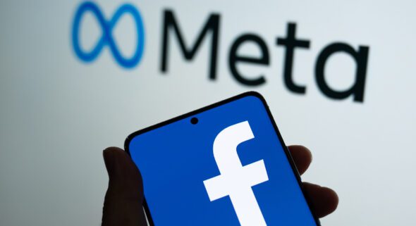 Facebook's parent company Meta logo is shown on a device screen