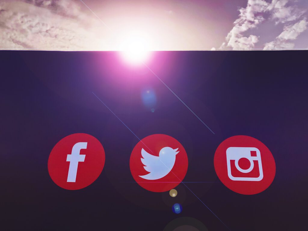 Facebook, Twitter and Instagram; the top three social media platform logos on a bill board