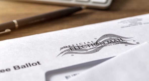 Mail-in ballot envelope on a desk