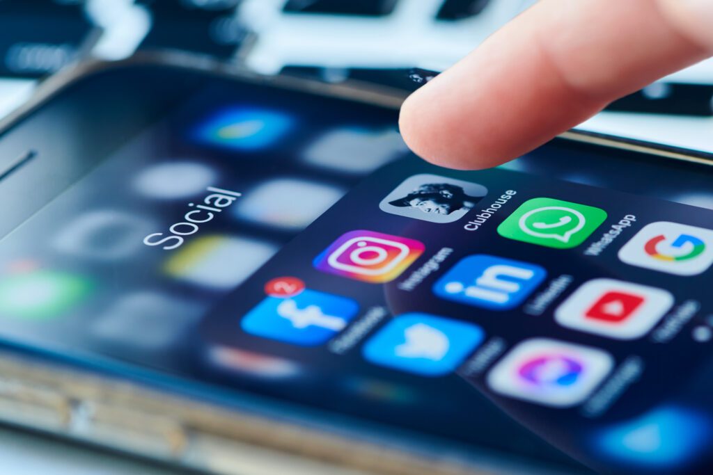 Social media apps on an iPhone screen
