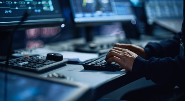 Cybersecurity specialist monitoring computer network