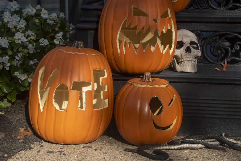The word VOTE is carved onto a halloween pumpkin decoration in the Logan neighborhood of Washington, DC.