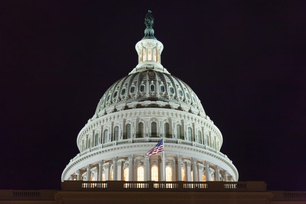 US Capitol building at night.