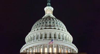 US Capitol building at night.