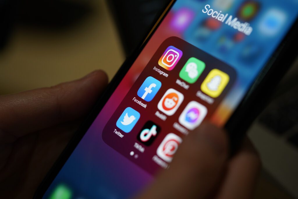 Social media applications on an iPhone screen