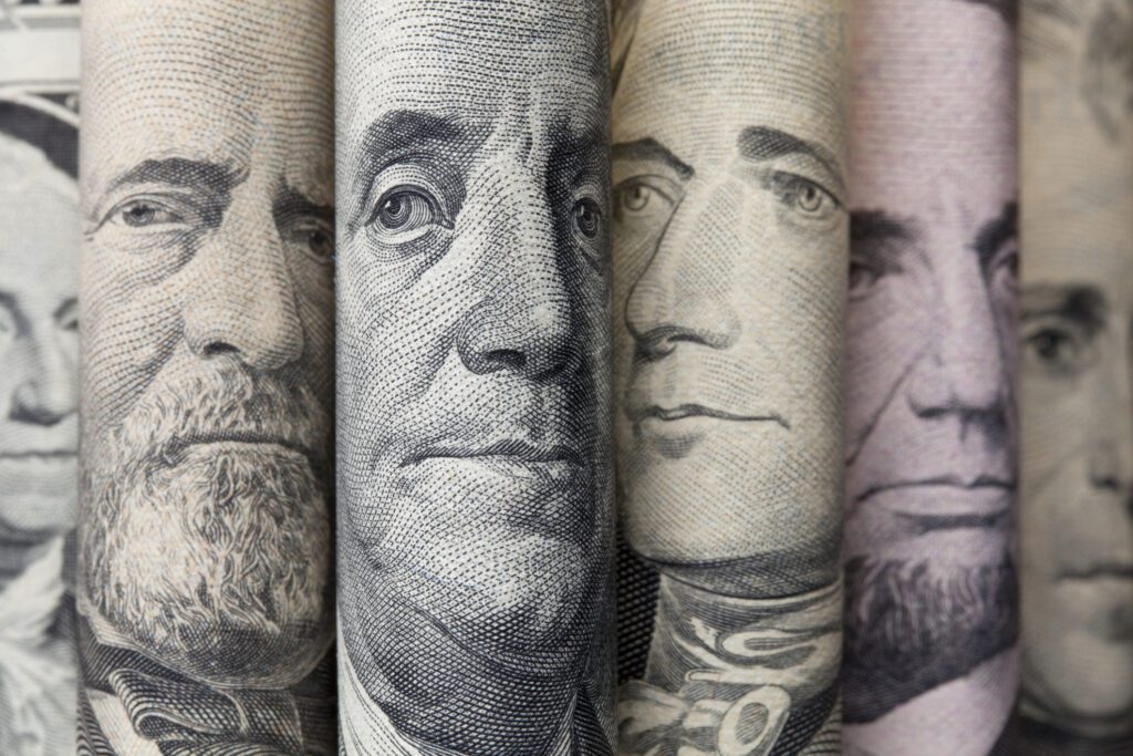 Close-up of presidents on US currency