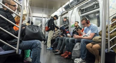 People traveling in a subway train in New York city